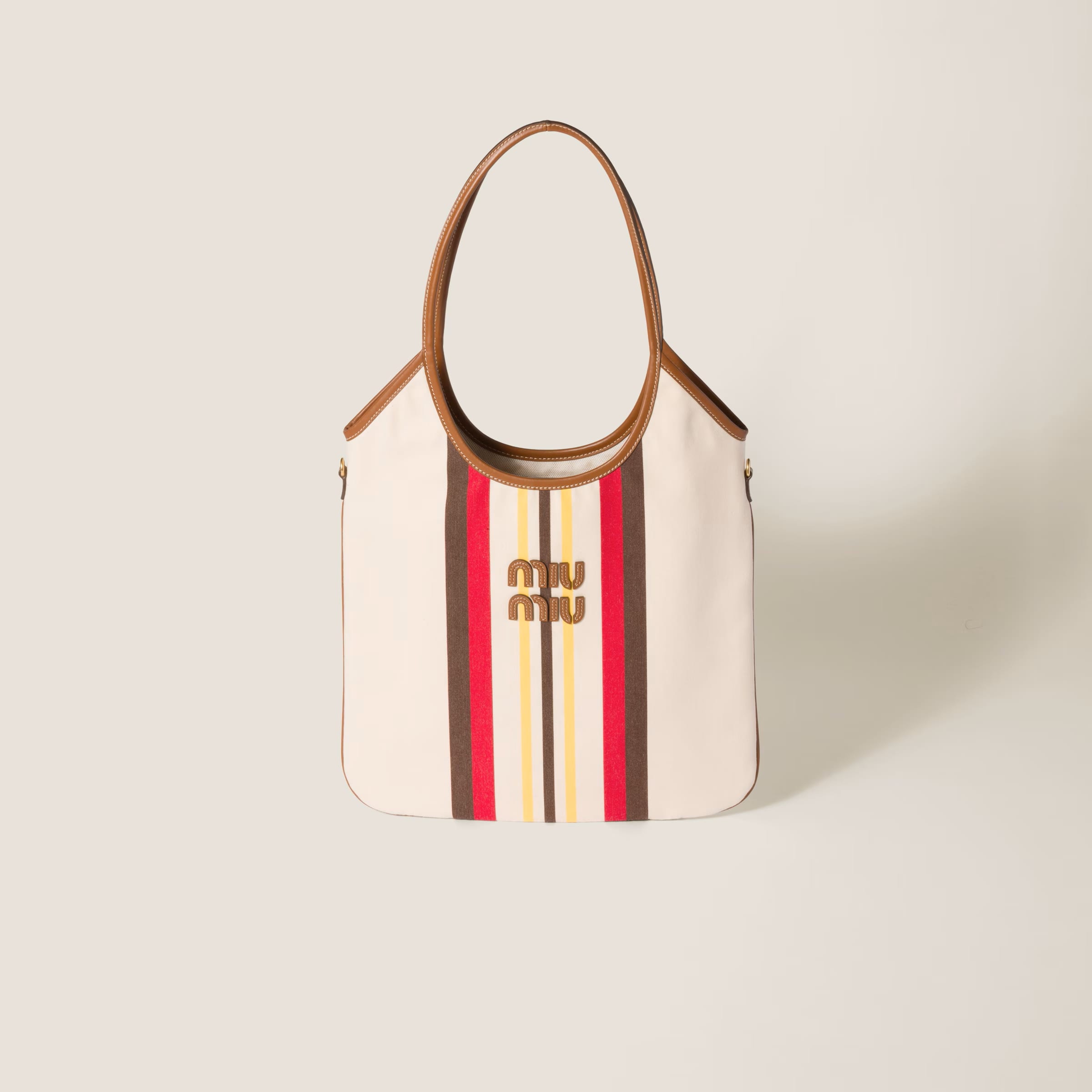 IVY canvas and leather bag - Beige/Dark Brown (Regular), SGD 2650 (approximately P116,886.31), MIU MIU, miumiu.com